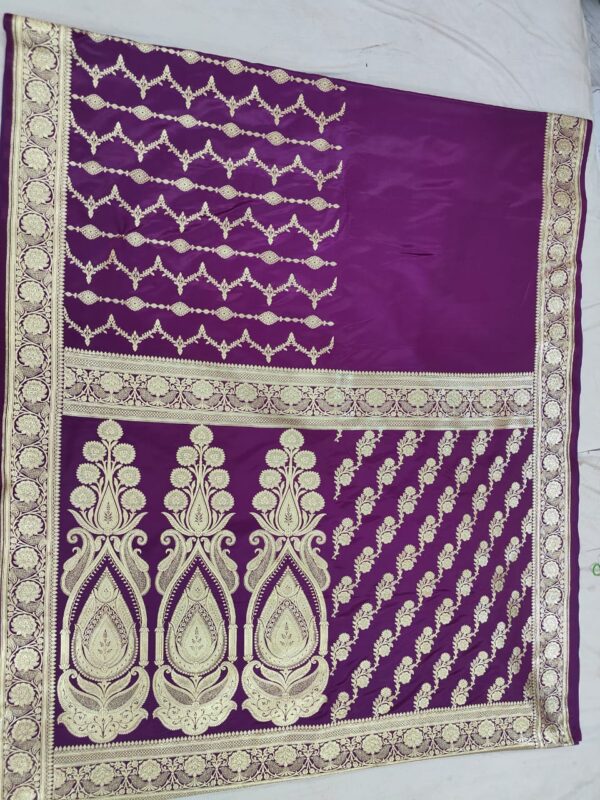 purple designer saree with golden zari work